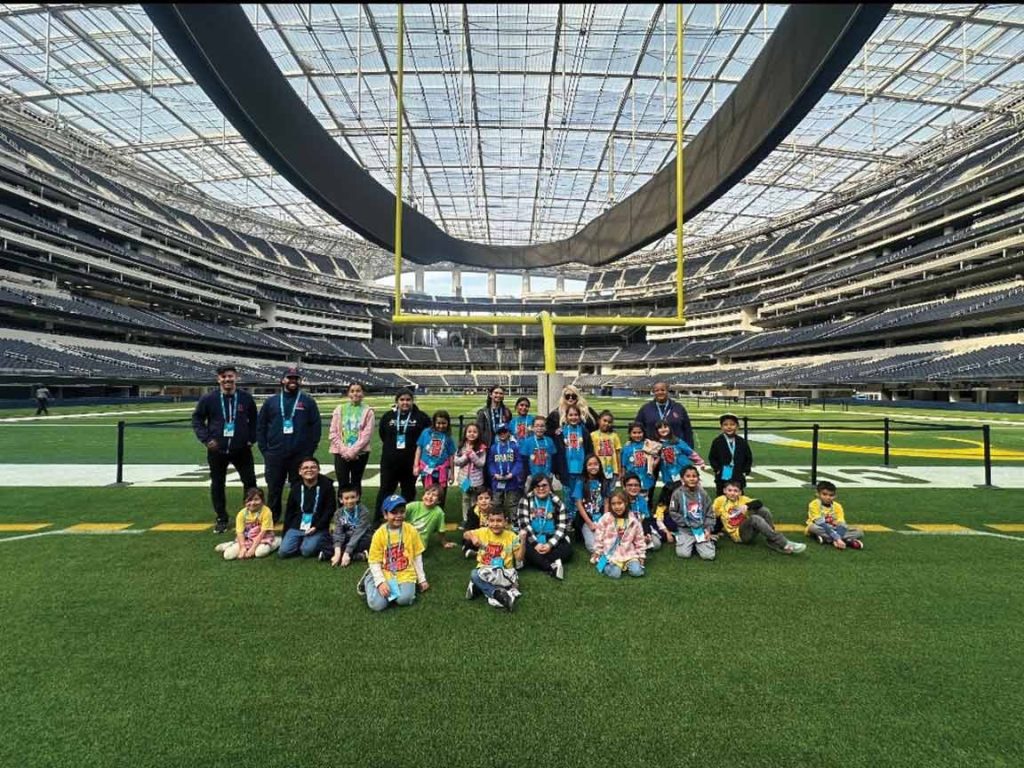 Camp kids on football field